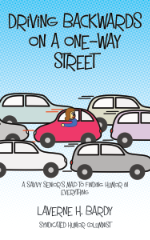 “Driving Backwards on a One-Way Street” book cover with a cartoon of a woman driving a car backwards in traffic
